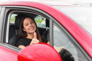 young woman driving a car